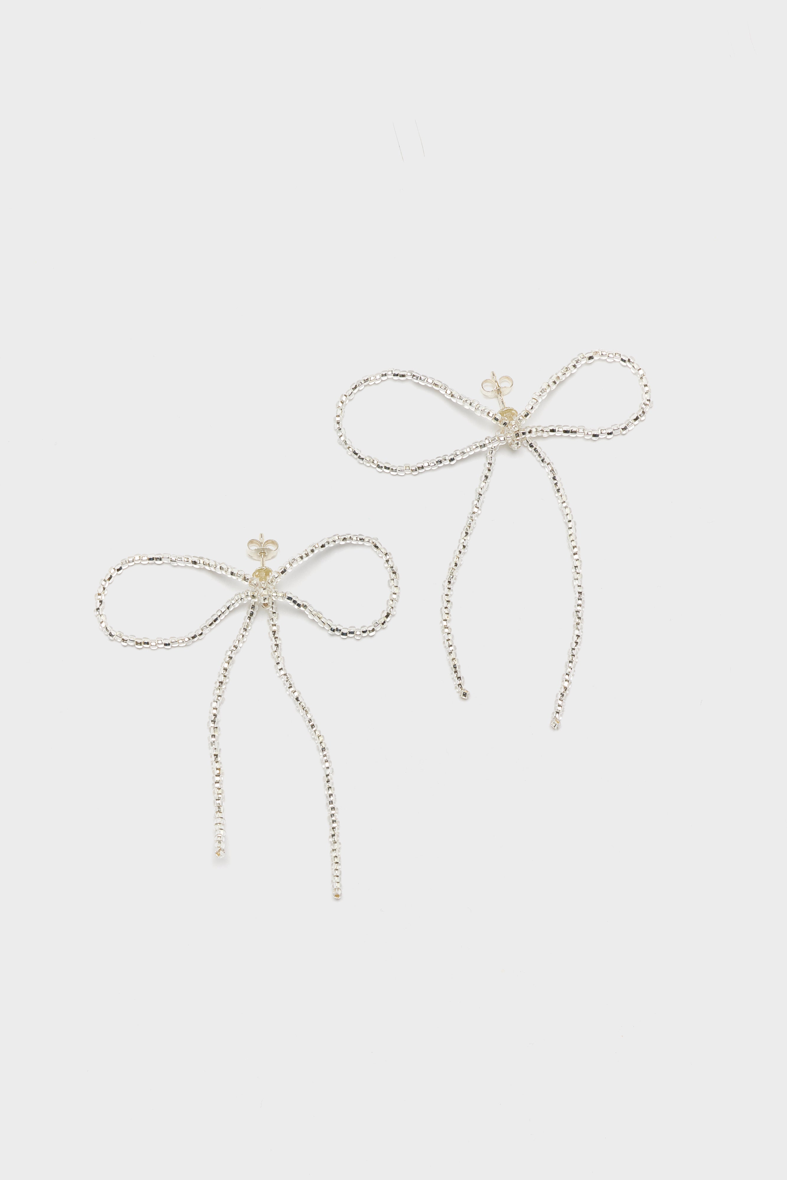 Sad Bow Ear Stick Earrings (252 / W / SILVER)